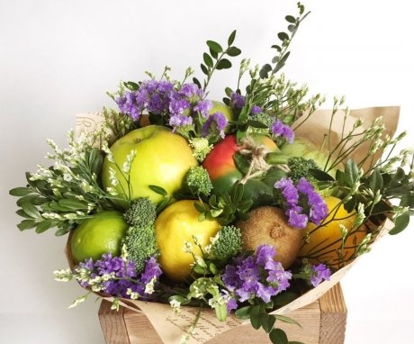 Original bouquets of flowers, fruits, sweets